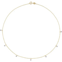 Seven-stone 1 1/8 CTW lab-grown diamond station necklace in 14K yellow gold