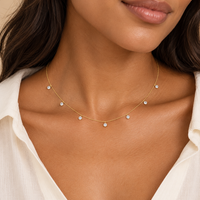 AI-generated styling view of seven-stone diamond station necklace; see product photo for exact details