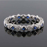 Yaf Sparkle, French cut Sapphire & Diamond ring
